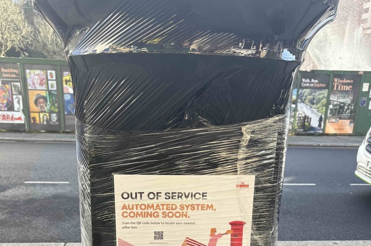 The message on the post box outside Continental Fruits in Duke Street, Tavistock.