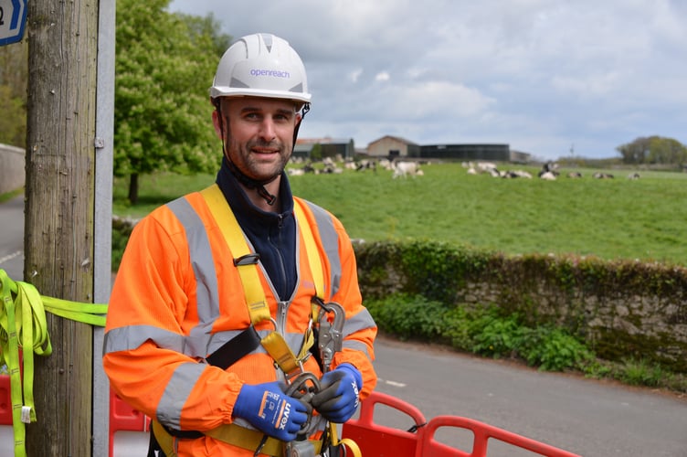 An Openreach engineer at work.