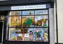 Okehampton bookshop unveils new window art inspired by Hugh Bonneville's debut novel