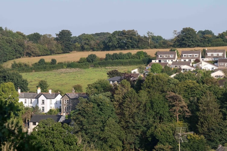 Residents on Violet Lane, Tavistock, are opposing a housing plan they say will be a blight on the countryside.  Steve Hart and Bob Chapman looking towards the proposed Violet Lane fields from the town centre.