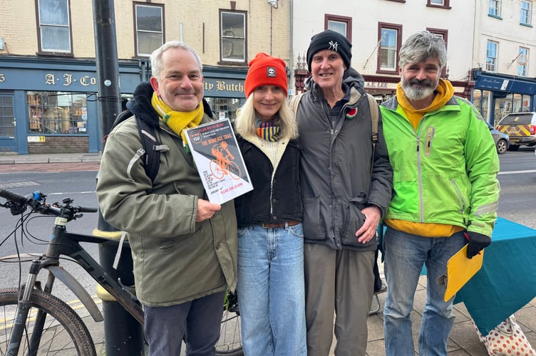 Members of Sustainable Crediton with Cllr Giles Fawssett, right, who collected signatures and email addresses of the public outside the Ship Hotel in Crediton in support of the Boniface Trail cycle route and walkway on December 13.  AQ 0449
