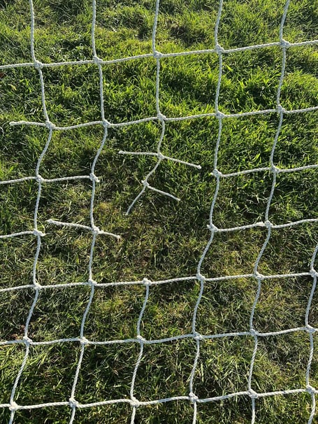 One of the holes cut in new goal nets at Morchard Bishop Football Club.
