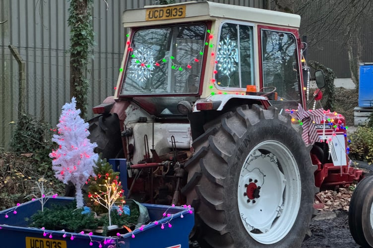 A Christmas tree and lights adorned one of the tractors taking part in the charity run.  AQ 0952
