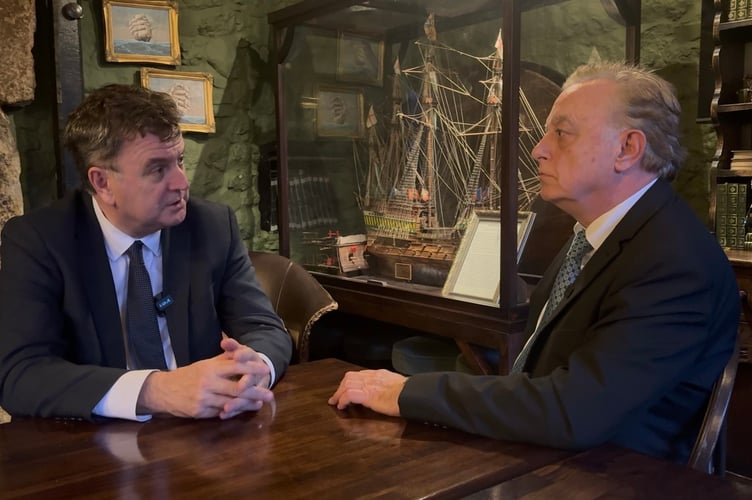 Sir Mel Stride (left) with Oxenham Arms owner, Simon Powell.