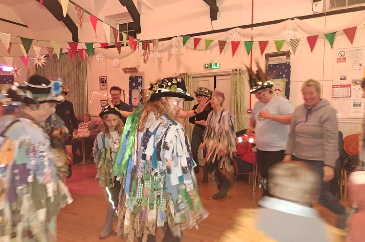 The Tavy & Tamar Apple Group leads the Bere Ferrers Wassail - the apple orchard blessing celebrations. Pictured is the Dartmoor Border Morris Group in energetic action.