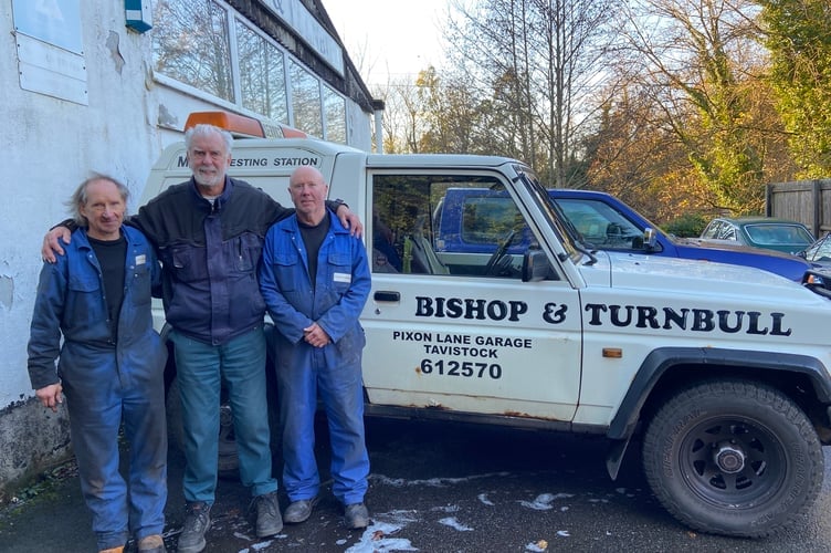 Garage owner Paul Bishop with long-time staff Andy Palmer, left, and Alf Birch.