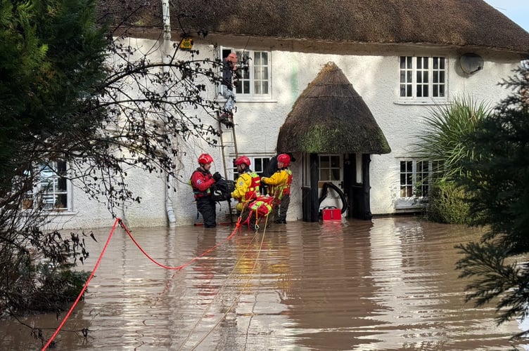 The rescuers from North Dartmoor Search and Rescue Team helping to rescue people from a house near the River Otter on Tuesday, January 27