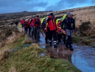 Volunteer rescuers help stricken moor casualty