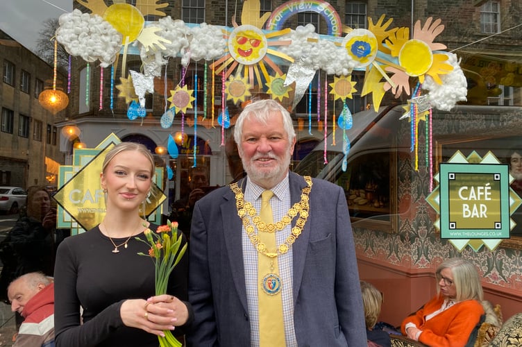 Tavistock Mayor Cllr Steve Hipsey joins Granito Lounge supervisor Tamzin Whitcomb launch Tavistock BID's Paint the Town project.