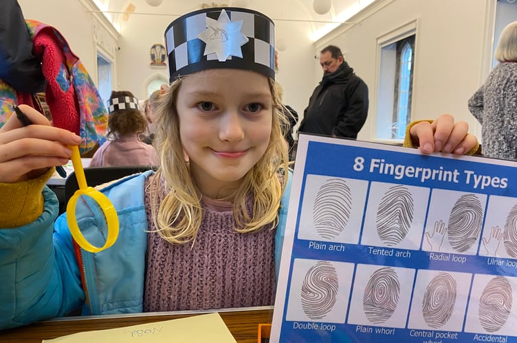 Mabal Bollons, 7, joined her dad Chris in a half term activity looking into the history of policing in Tavistock.