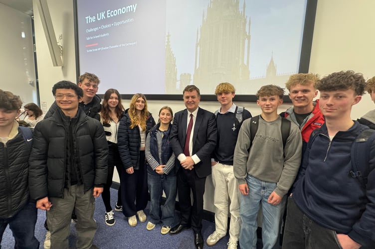 Central Devon MP Sir Mel Stride with A-level Economics students on a visit to Exeter College.