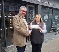 Co-op donates £150 to Gunnislake village hall for repairs