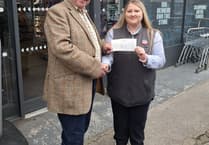 Co-op donates £150 to Gunnislake village hall for repairs