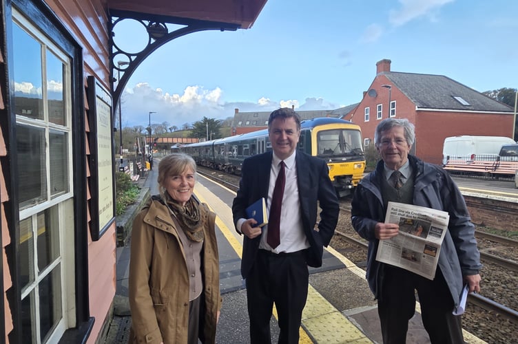 Sir Mel Stride (centre) at Credition Station meeting campaigners including president of the North Devon Line Rail Promotion Group, Andrea Davis (left).