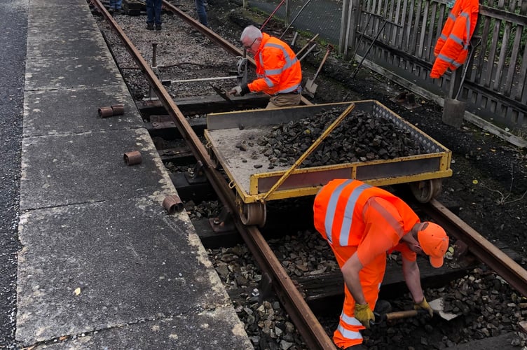Volunteers from the Tarka Valley Railway Group replacing sleepers on the line.