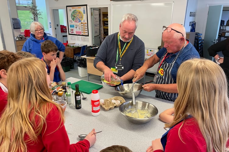 Showing the pupils how to make homemade mayonnaise