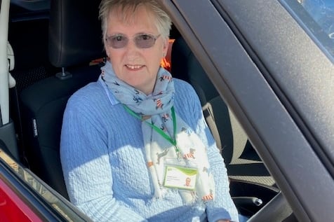 Debbie from ODCTG behind the wheel of her car