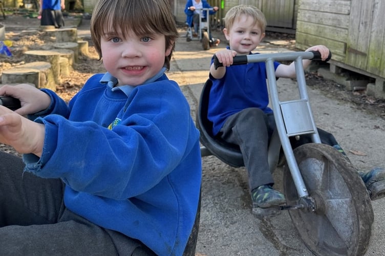 Getting active on trikes in Lifton Community Academy's new outdoor 'classroom'.
