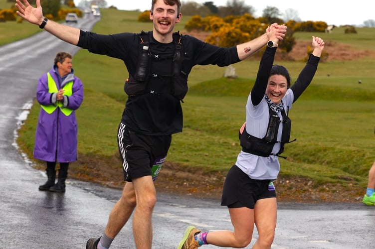 Sharing the pain of running 26 miles are these two racers tackling the Dartmoor Marathon which returned on Sunday, April 12, after a 40-year absence. Picture by Chris Cottrell.