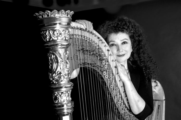 Harpist Elizabeth-Jane Baldry is performing in her home village of Chagford at a rare screening of a silent film. Photograph by Julia Hobday.
