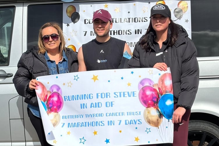 Runner Joe Benjamin-Guest has finished a week of marathons in support of seriously ill family friend Steve Hemmings. Pictured welcoming Joe after his final run are Steves nieces, Natalie and Lauren. Picture by Kay Benjamin.