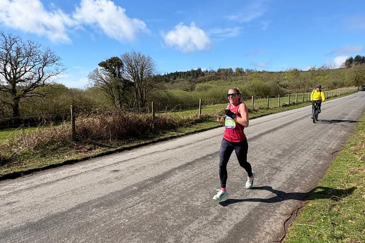 Okehampton Running Club member Joanne Page on the Dartmoor Marathon. She finished first woman. Picture by Charles Whitton Sports Photography.