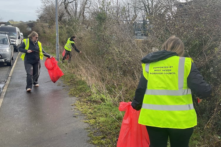 The Anchorman Insurance team, carrying out their litter pick.