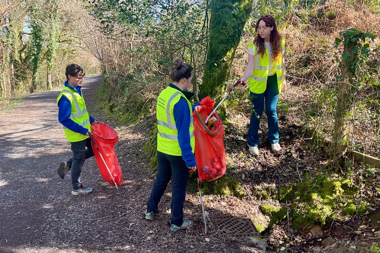 The Okehampton YHA volunteers carrying out their litter pick.