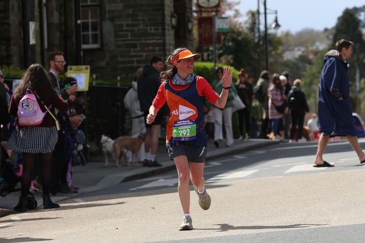 Amanda McOwan White finishes the gruelling Dartmoor Marathon in tribute to her family members.
