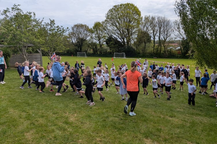 Warming up at Bow School for the mini London Marathon.
