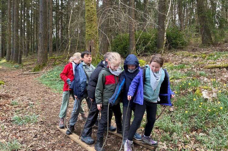 St Andrews School, Buckland Monachorum, pupils show teamwork on their Dartmoor residential adventure.