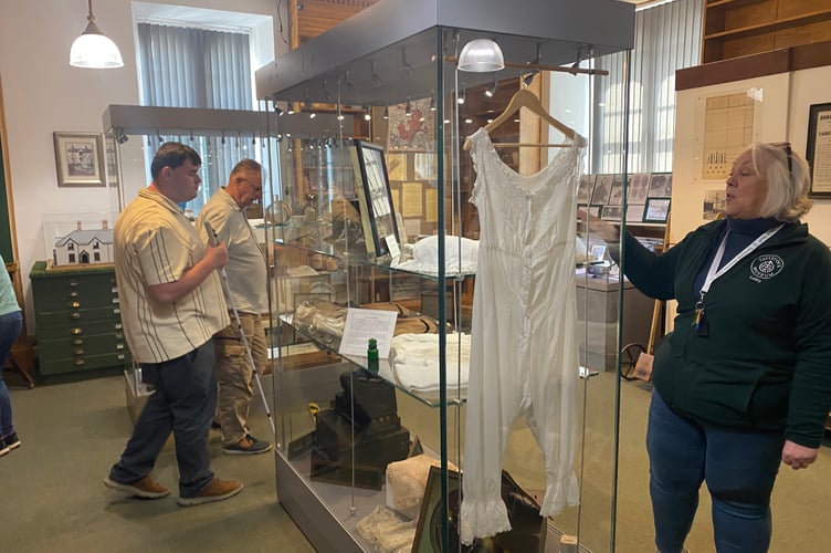 Tavistock Museum launched this year's season after a winter of exiting plans came to fruition. Museum manager Lesley Holliday (right) is pictured showing launch guests round the new displays.