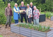 Okehampton Community Garden presented with plaque following grant support