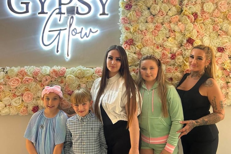 Amber-Leigh Langdon-Parsons (far right) celebrating the opening of her new beauty parlour Amber Glow.