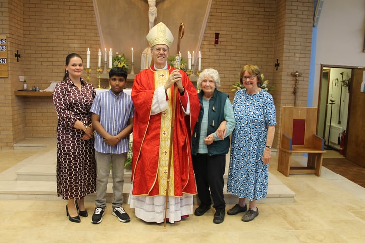 Bishop Nicholas with, left, Angelika Kuc, an altar server and right, the organist, and sacristan, Gwyneth Leonard.  AQ 1518
