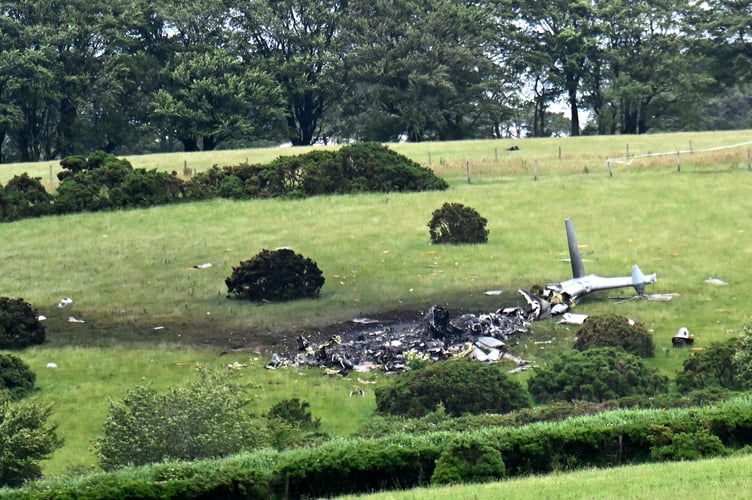The scene of the crash, a Royal Navy Merlin helicopter almost completely destroyed.
