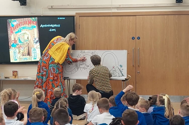 The storytelling workshop at Lifton Community Academy with two children's authors.