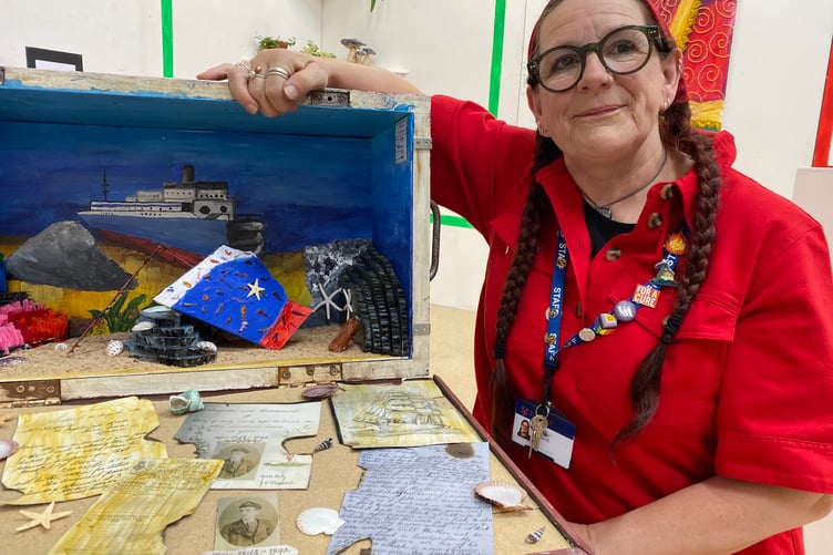 Mount Kelly College art teacher Netty Holwill shows off a student's 3-D exams project piece from Mount Kelly College.