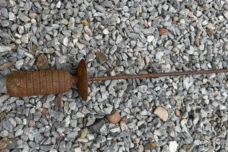 The German rifle grenade from the First World War with its long rod and small tube on the end.