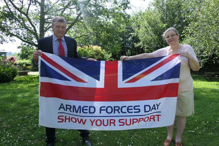 Cllr Chris Edmonds, mayor of West Devon, with Cllr Mandy Ewings, Leader of West Devon Borough Council, with the Armed Forces Day flag being flown at the council offices.