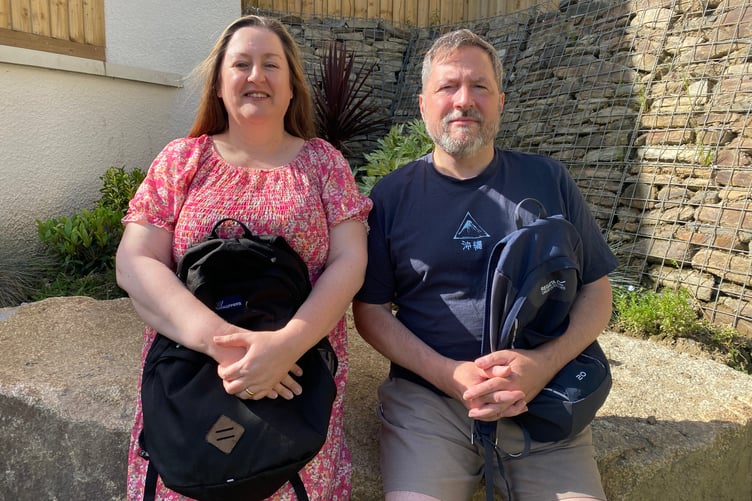 Intrepid traveller Beatrix Love, pictured with husband Jahred, are pictured with their rucksacks ready for a fund raising challenge.