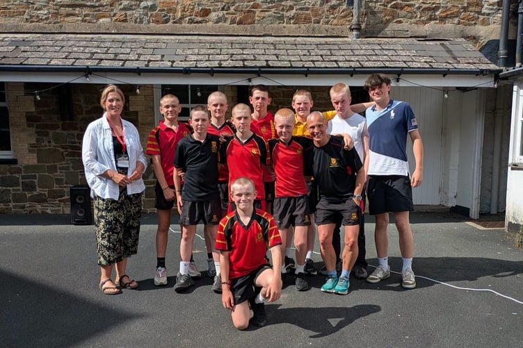 Ms Vetch and the Shebbear College students after their shave.