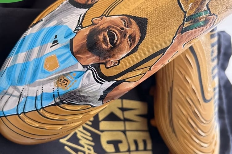 Legendary Argentine footballer Lionel Messi is hand-painted on the boots being auctioned for Margaret Green Animal Rescue.