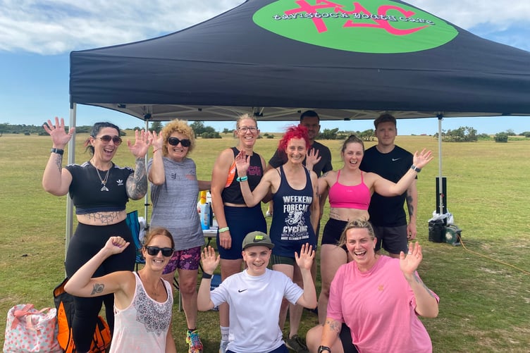 Keen gym exercise fans tackle the 1,000-repeat outdoor gym challenge in Whitchurch in aid of Tavistock Youth Cafe.