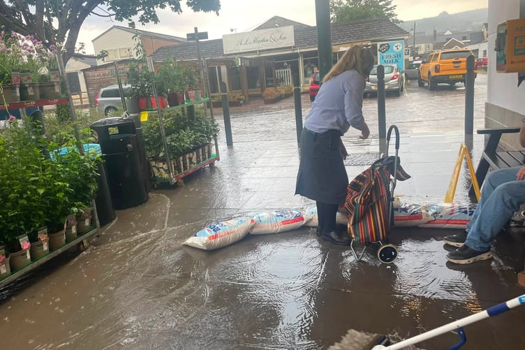 Flash flooding outside Waitrose and on School Way in Okehampton on Thursday evening.