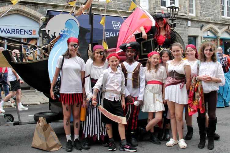 The carnival's young ambassadors taking part in the Tavistock Carnival parade, dressed as pirates complete with ship.