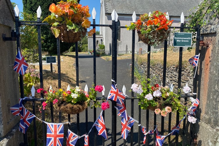 Bere Alston's Holy Trinity church welcomed the Bere Alston In Bloom competition judges with a patriotic floral gate decorations.