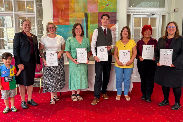Loyal staff receive their long service awards at a ceremony at the Bedford Hotel.