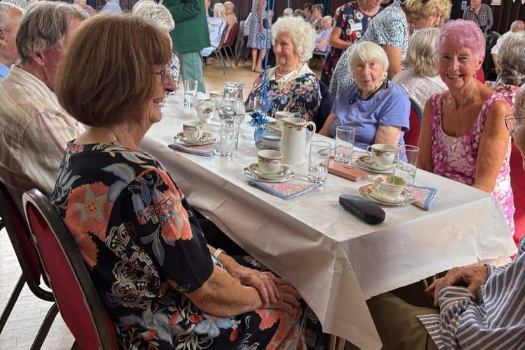 Tavistock Memory Cafe carers, family, volunteers and guest, celebrated its twentieth year by dancing and socialising in Tavistock Town Hall.