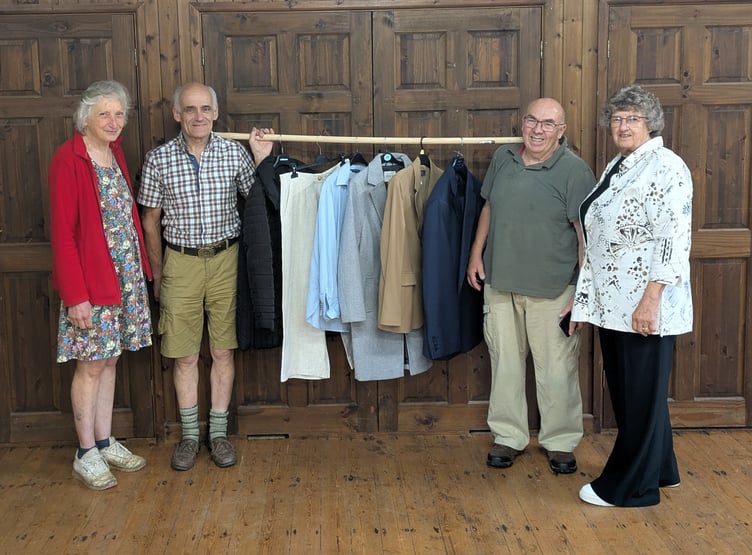 Pictured with some of the clothes already donated for the 50/50 Sale at Milton Abbot Village Hall. From left are committee members Sonia Watson, chairman Jonathan Watson, Andy Harrap and Chris Harrap.